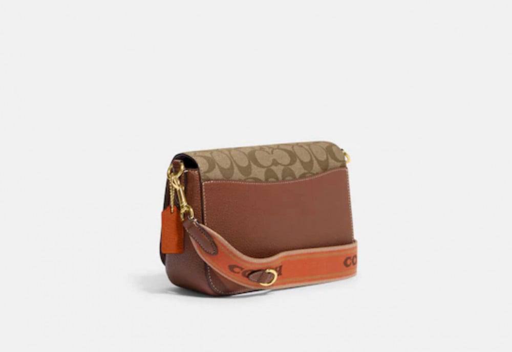 Coach Logan Messenger In Signature Canvas