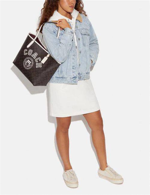 Coach City Tote In Signature Canvas With Varsity Motif