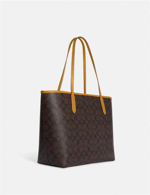 Coach City Tote In Signature Canvas With Varsity Motif In Yellow