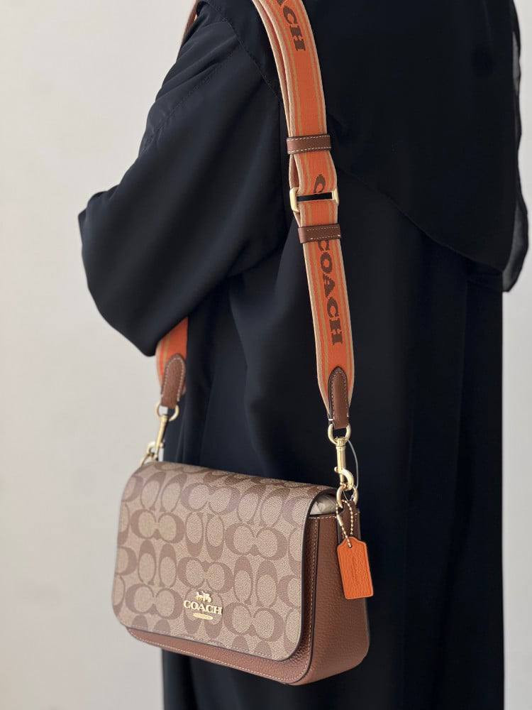 Coach Logan Messenger In Signature Canvas